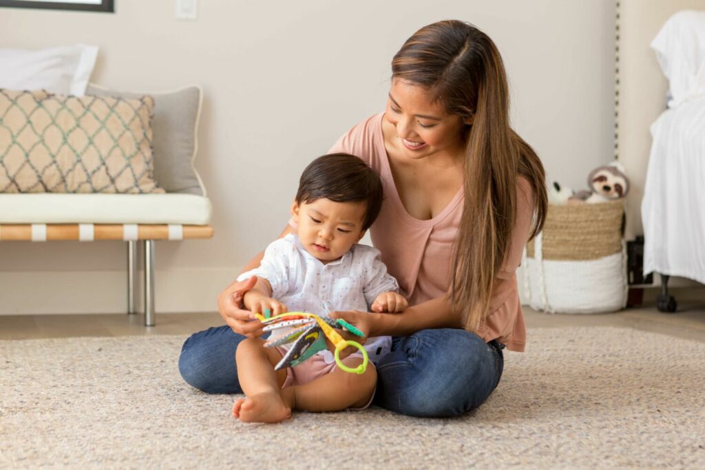 Навесная книга с прорезывателем INFANTINO Животные (005362I)