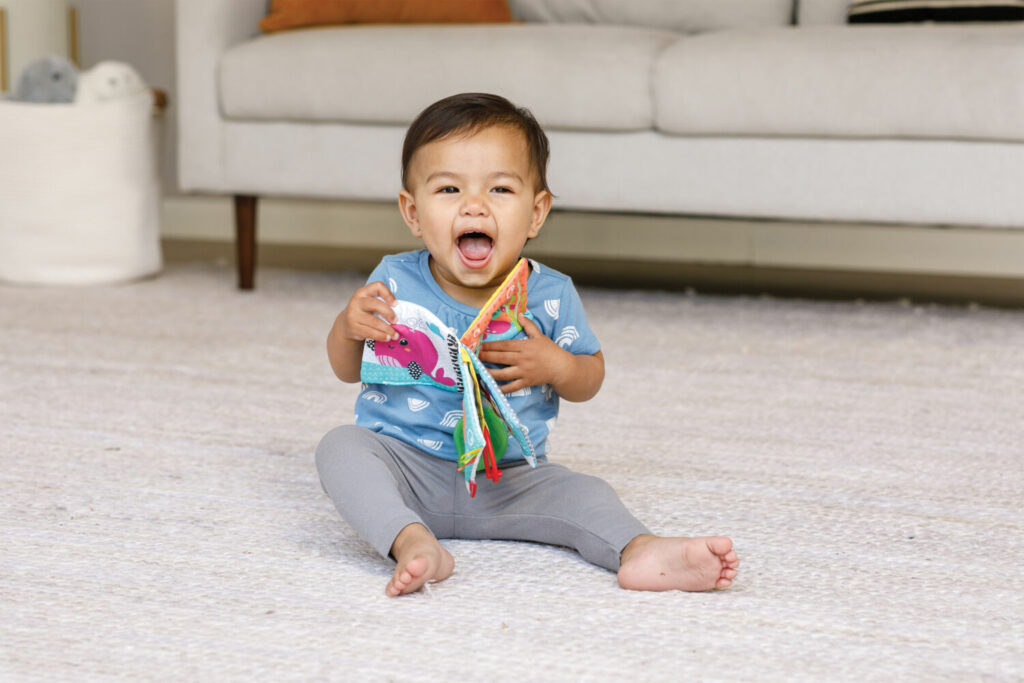 Infantino Навесная книга с прорезывателем &#171;Восьминожка&#187; (315201)